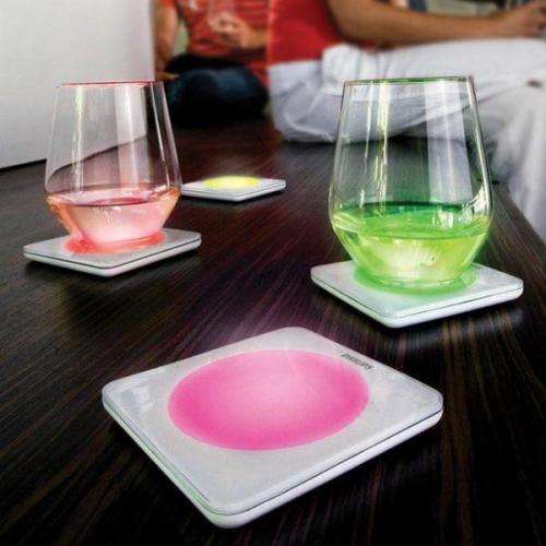 8 Phillips colour changing coasters with charging plate.