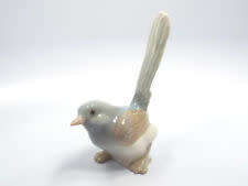 A pair of Lladro Wrens #1053 and #1054 `pajarito Feo by Antonio Ruiz