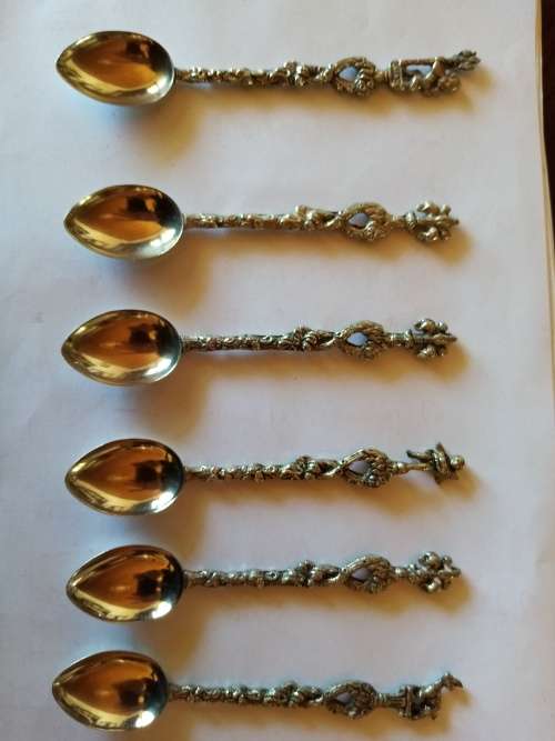 Six Italian coffee spoons and sugar tongues