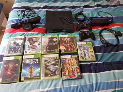 XBOX 360 WITH KINECT AND 9 GAMES!