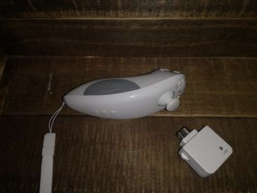 NINTENDO WII WITH 2 CONTROLLERS AND 2 NUNCHUCKS AND TOP SHOT ELITE