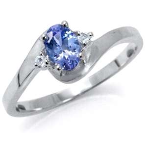 [R6638.60] Exquisite 0.52ct Genuine Tanzanite and Topaz Engagement Ring. Size 5 / K