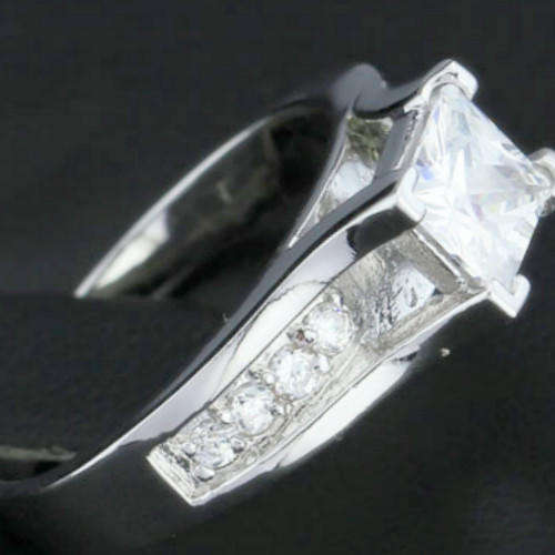 Extraordinary 1.52 Carat Cr. Diamond Princess with Accents Engagement Ring