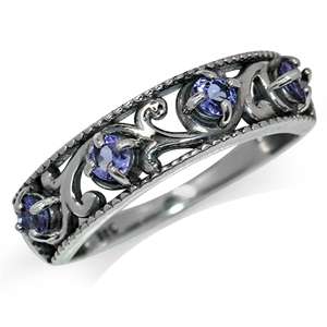 0.48ct. 4-Stone Natural Tanzanite 925 Solid Silver Filigree Ring. Size 7