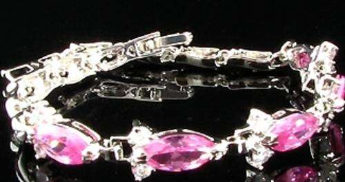 Beautiful Brand New Pink CZ 18krgp Tennis Bracelet