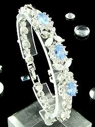 ASHA CRAFT - Elegant Cr. Swiss Blue and White Topaz Ladies Tennis Bracelet