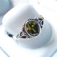 Sterling silver ring with a peridot coloured stone