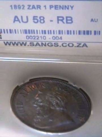 1892 ZAR PENNY GRADED AU58 RB BY SANGS