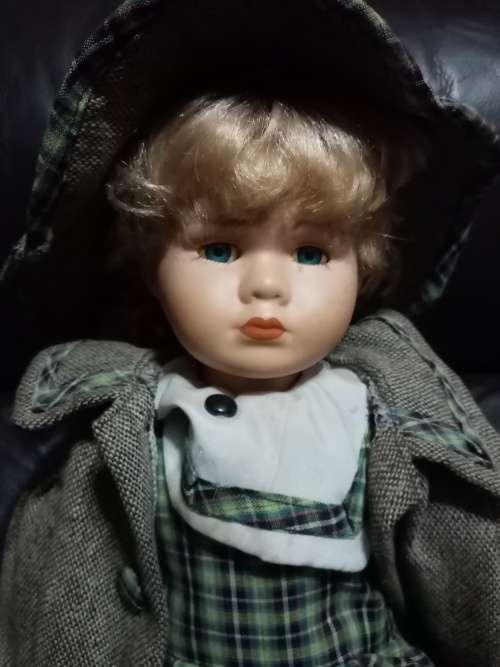 Porcelain Doll with hat