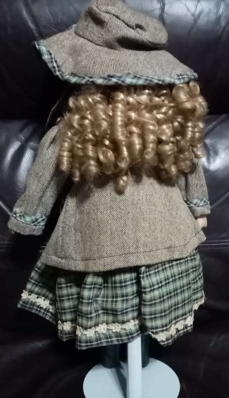 Porcelain Doll with hat