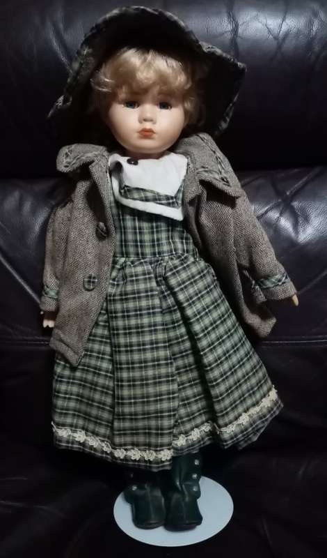 Porcelain Doll with hat