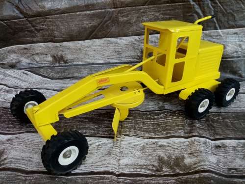 Vintage Strike Yellow Grader