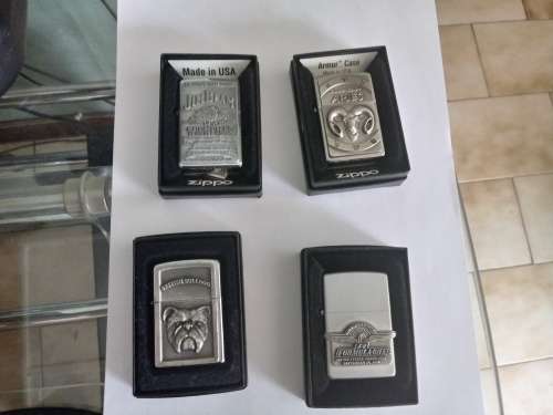 4 Heavy Plated never used Zippo's, 1 rare used Jack Daniels with chain and pouch. Free Shipping!