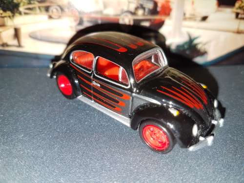 Johnny Lightning Volkswagen Beetle Sedan Black and Red