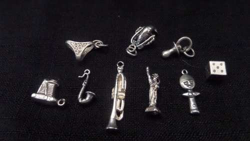 9 x Silver Charms (not all are marked but tested silver)