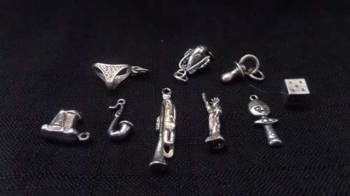 9 x Silver Charms (not all are marked but tested silver)