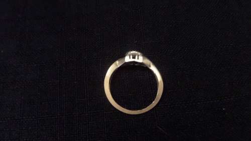 9 ct Gold Ring with a Cluster of small Diamonds Dim 16mm 2.3 grams ( note 1 small diamond missing)