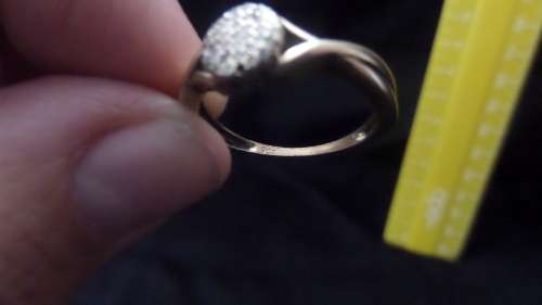 9 ct Gold Ring with a Cluster of small Diamonds Dim 16mm 2.3 grams ( note 1 small diamond missing)