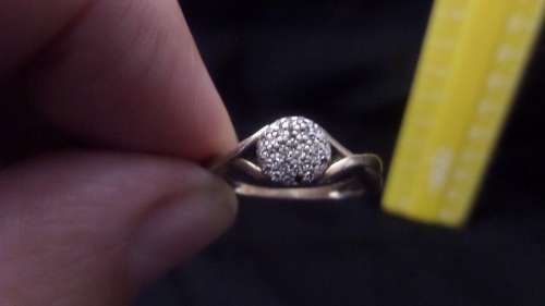 9 ct Gold Ring with a Cluster of small Diamonds Dim 16mm 2.3 grams ( note 1 small diamond missing)