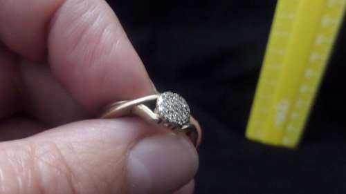 9 ct Gold Ring with a Cluster of small Diamonds Dim 16mm 2.3 grams ( note 1 small diamond missing)