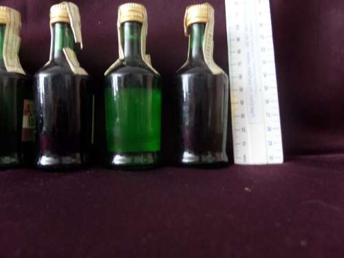 8 x Interesting Imported Miniature Bottles still sealed (bid for the lot)