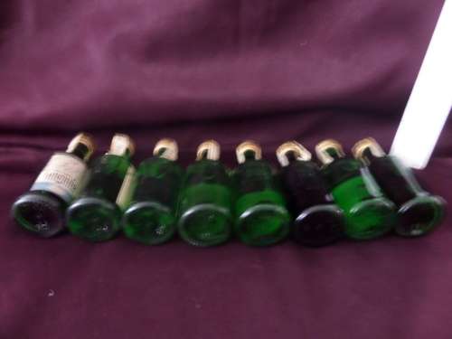 8 x Interesting Imported Miniature Bottles still sealed (bid for the lot)