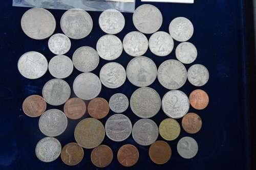 Lot of International Coins and a 1946 Petrol Ration Coupon(Some coins are Silver)