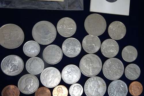 Lot of International Coins and a 1946 Petrol Ration Coupon(Some coins are Silver)