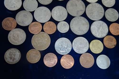 Lot of International Coins and a 1946 Petrol Ration Coupon(Some coins are Silver)