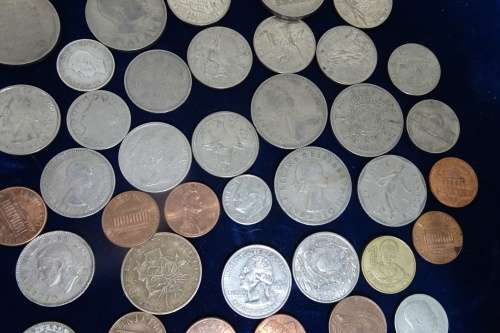 Lot of International Coins and a 1946 Petrol Ration Coupon(Some coins are Silver)