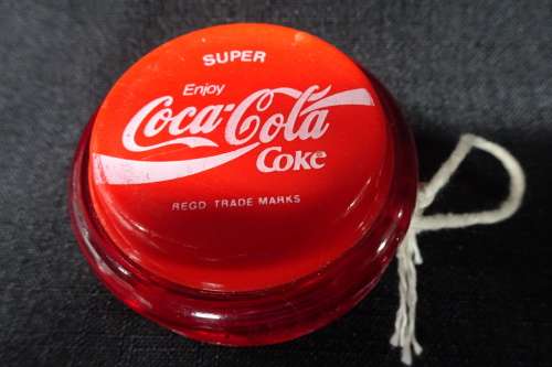 Vintage Super Coca-Cola Yo-Yo. "Coca-Cola" Written in Cursive.