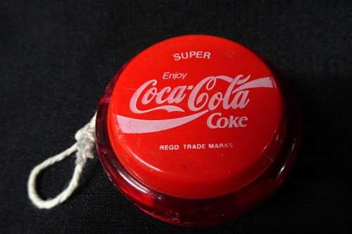 Vintage Super Coca-Cola Yo-Yo. "Coca-Cola" Written in Cursive.