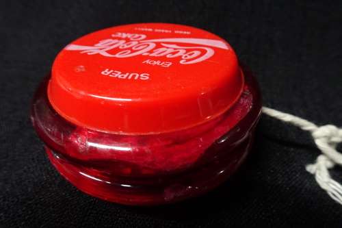 Vintage Super Coca-Cola Yo-Yo. "Coca-Cola" Written in Cursive.