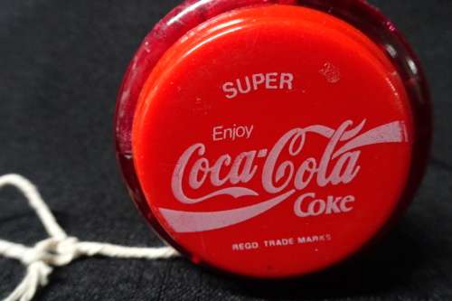 Vintage Super Coca-Cola Yo-Yo. "Coca-Cola" Written in Cursive.