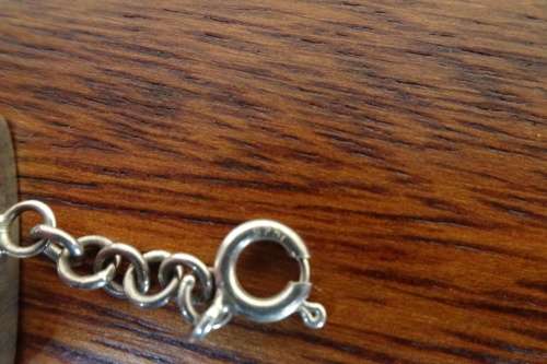 Unusual Artisan Sterling Silver Linked Bracelet with Triangular Onyx/Mother of Pearl Inlay Shapes