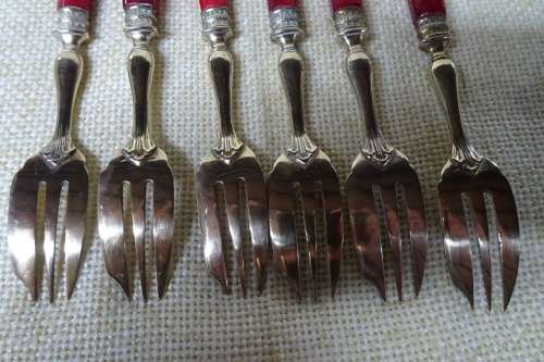 Unusual Vintage Set of Six Dessert Forks Brass With Red Handles in Original Box.