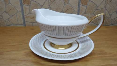 Beautiful Royal Albert Bone China `Capri` Gravy Boat and Underplate. Made in England.