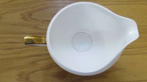 Beautiful Royal Albert Bone China `Capri` Gravy Boat and Underplate. Made in England.