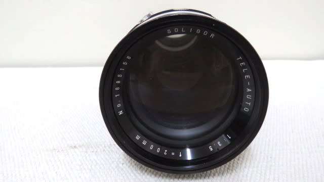 Four Vintage Cased Camera Lenses Details In Description SOLD AS IS