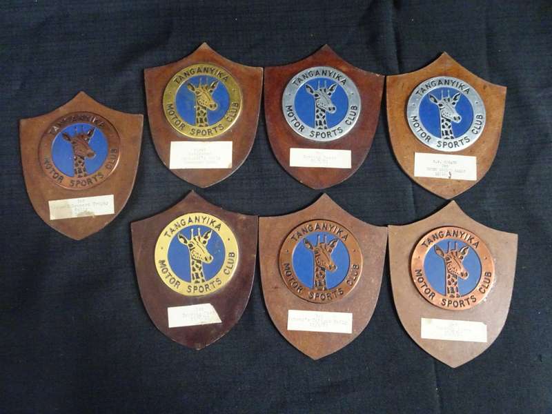 Seven Tanganyika Motor Sports Club Badges And Plagues (H - 16cm / B - 12.5cm)