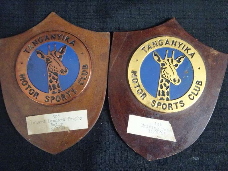 Seven Tanganyika Motor Sports Club Badges And Plagues (H - 16cm / B - 12.5cm)