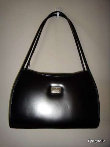 Black Gucci bag.