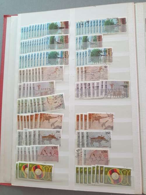 OLD DEALER`S ALBUM WITH ZIMBABWE MANY DUPLICATES ETC. BIG CV. AS PER PHOTOS. NB: PLS READ BELOW!!