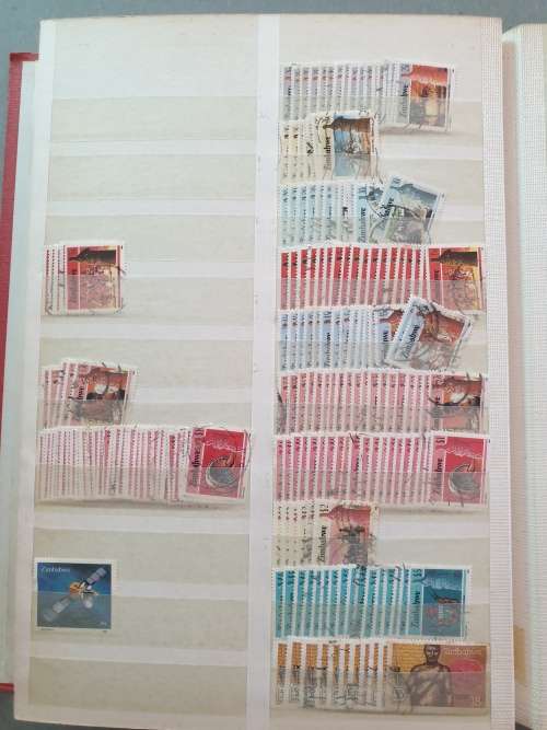 OLD DEALER`S ALBUM WITH ZIMBABWE MANY DUPLICATES ETC. BIG CV. AS PER PHOTOS. NB: PLS READ BELOW!!