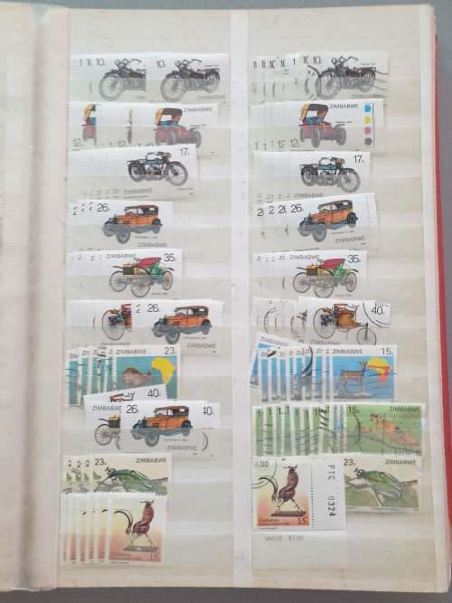 OLD DEALER`S ALBUM WITH ZIMBABWE MANY DUPLICATES ETC. BIG CV. AS PER PHOTOS. NB: PLS READ BELOW!!