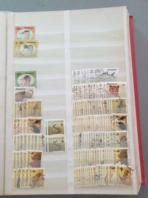 OLD DEALER`S ALBUM WITH ZIMBABWE MANY DUPLICATES ETC. BIG CV. AS PER PHOTOS. NB: PLS READ BELOW!!
