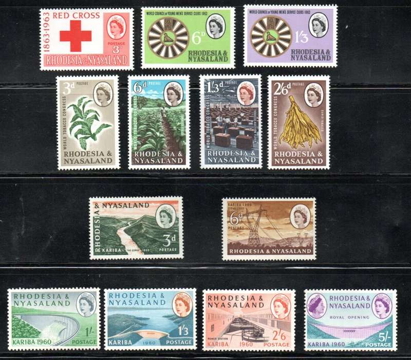 RHODESIA AND NYASALAND 1960-3 MINT SETS. AS PER SCANS. NICE LOT.