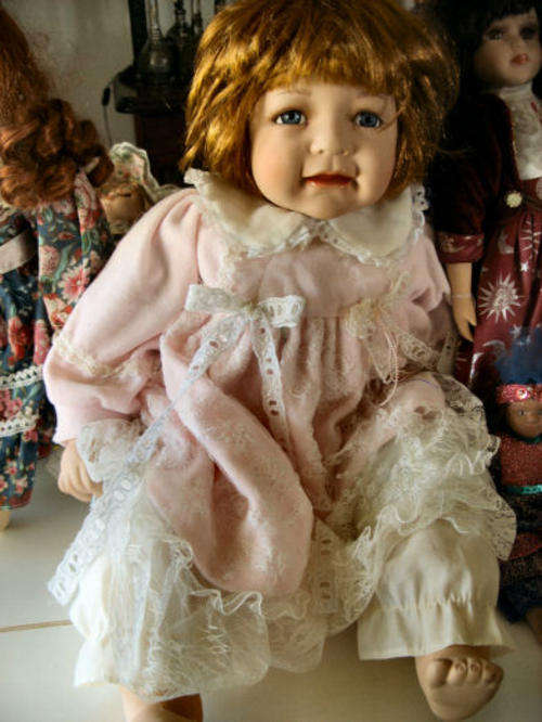 Seven Porcelain Dolls Highly collectable!