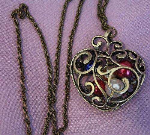 Heart Bead cage with beads Necklace / Pendant