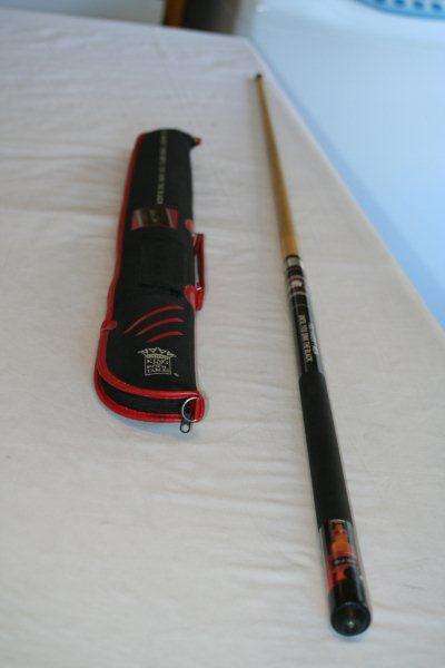 An AWESOME Black Label branded pool cue and storage bag!!